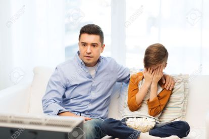 50589645-family-people-technology-television-and-entertainment-concept-scared-father-and-son-watching-horror--Stock-Photo.jpg
